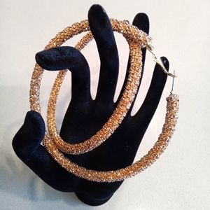Gold hoop earrings/ like new